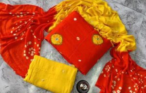 Myra Sensational Salwar Suits & Bandhani Dress Materials, Fabric Rayon, Color Orange, Length 2.5 Meters